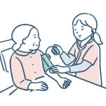 血圧測定する看護師